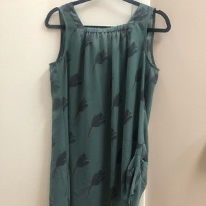 Blueish green sleeveless blouse